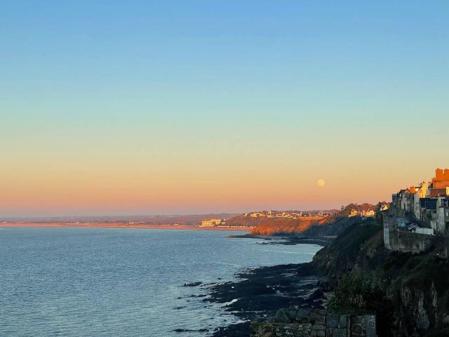 Sunset over Haute-Ville, Granville's historic district.