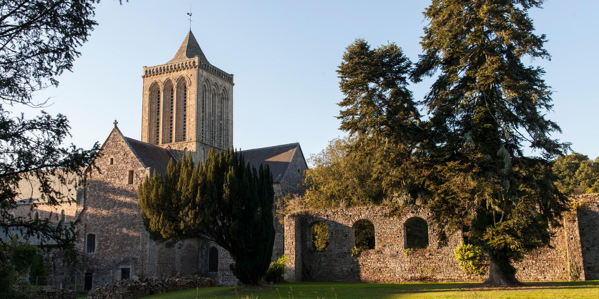 La Lucerne Abbey, 12th-century architecture in a green setting