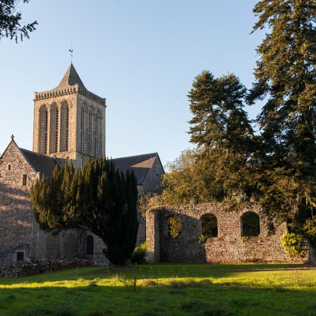 La Lucerne Abbey, 12th-century architecture in a green setting